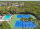 Aerial view of community amenities including the pool and tennis courts at 542 Black Lion Ne Dr, St Petersburg, FL 33716