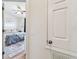 Bedroom view from doorway featuring stylish decor, and comfortable bed at 542 Black Lion Ne Dr, St Petersburg, FL 33716