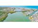 Beautiful aerial view of the community with waterfront access and stunning blue water at 615 Garland Cir, Indian Rocks Beach, FL 33785