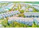 Stunning aerial view of a waterfront community featuring beautiful townhomes and boat docks at 615 Garland Cir, Indian Rocks Beach, FL 33785