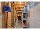 The basement has a cement wall and exposed beams and ceiling at 615 Garland Cir, Indian Rocks Beach, FL 33785