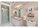 Bright bathroom featuring a shower, neutral walls, and decorative accents for a relaxing atmosphere at 615 Garland Cir, Indian Rocks Beach, FL 33785