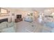 Spacious living room with a fireplace, comfortable seating and an open floor plan at 615 Garland Cir, Indian Rocks Beach, FL 33785