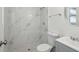 Bathroom featuring updated shower with marble and updated sink at 6235 Viola Ln, New Port Richey, FL 34653