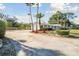 Charming home with lush tropical landscaping and a large driveway at 6235 Viola Ln, New Port Richey, FL 34653