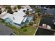 Beautiful waterfront home featuring a pool, dock, and boat lift on a sunny day at 6319 Cocoa Ln, Apollo Beach, FL 33572