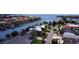 Aerial view of canal front houses highlighting waterfront living with boat docks, lush landscaping, and community appeal at 6319 Cocoa Ln, Apollo Beach, FL 33572
