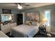 Cozy bedroom featuring natural light, neutral tones, and comfortable furnishings for a relaxing ambiance at 6319 Cocoa Ln, Apollo Beach, FL 33572