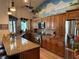 Stylish kitchen with a large island, stainless steel appliances, and custom cabinetry at 6319 Cocoa Ln, Apollo Beach, FL 33572