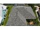 Aerial view of the multi-tone roof on this waterfront property, providing a protective barrier for years to come at 6319 Cocoa Ln, Apollo Beach, FL 33572