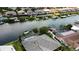 Aerial view of canal-front homes, each with private docks and waterfront access, creating a scenic and desirable community at 6319 Cocoa Ln, Apollo Beach, FL 33572
