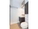 Contemporary bathroom with vessel sink, stylish vanity, and a tiled accent wall at 6426 31St S St, St Petersburg, FL 33712