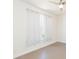 Bright bedroom featuring a window, tiled floors and ceiling fan for added comfort at 6426 31St S St, St Petersburg, FL 33712