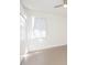 Clean, bright bedroom featuring a window, tiled floors and a closet for storage at 6426 31St S St, St Petersburg, FL 33712