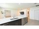 Open-concept kitchen with stainless steel appliances and a large island countertop at 6426 31St S St, St Petersburg, FL 33712