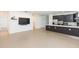 Spacious open-concept layout featuring modern tile flooring and seamlessly connects to the kitchen at 6426 31St S St, St Petersburg, FL 33712