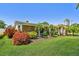 Charming home with brick accents, manicured landscaping, and lush green lawn at 6667 28Th S St, St Petersburg, FL 33712