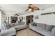 Open concept living room and dining area featuring neutral tones and lots of natural light at 6667 28Th S St, St Petersburg, FL 33712