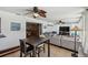 Spacious sunroom featuring tiled floors, comfortable seating, and a dining area at 6667 28Th S St, St Petersburg, FL 33712