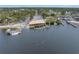 Aerial view of a waterfront boat dock and boat ramp on a sunny day at 7819 Chasco St, Port Richey, FL 34668