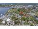 Waterfront community with residential homes and marina for boating enthusiasts, showcasing a unique coastal lifestyle at 7819 Chasco St, Port Richey, FL 34668