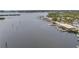 Aerial view showcases waterfront restaurants with docks, a boat ramp, and scenic waterfront views, perfect for boaters at 7819 Chasco St, Port Richey, FL 34668