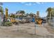 Secured boat storage yard with multiple forklifts on location, providing convenient boat storage at 7819 Chasco St, Port Richey, FL 34668