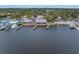Aerial view of Hooters on the water with docks and boat access at 7819 Chasco St, Port Richey, FL 34668