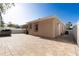 Spacious backyard with a paved patio, offering a clean and versatile outdoor space at 810 W Whatley Pl, Tampa, FL 33604