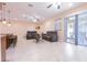 Open concept living room with seating and an outdoor view at 810 W Whatley Pl, Tampa, FL 33604