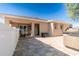 Outdoor patio area with backyard, hot tub, seating, and a manicured lawn at 810 W Whatley Pl, Tampa, FL 33604