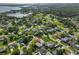Beautiful coastal community with lush landscaping, nearby waterfront views, and winding neighborhood streets at 8420 Orient Ne Way, St Petersburg, FL 33702
