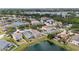Aerial view of the community showcasing the homes, ponds, and lush landscape at 10108 36Th E Ct, Parrish, FL 34219