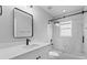Modern bathroom featuring a glass shower door and sleek vanity at 10108 36Th E Ct, Parrish, FL 34219