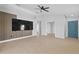 Bright, open living area with modern accents and neutral tile flooring at 10108 36Th E Ct, Parrish, FL 34219