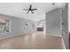 Open living space featuring neutral walls, tile flooring and views into the kitchen at 10108 36Th E Ct, Parrish, FL 34219