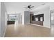 Bright, open living area with modern accents and neutral tile flooring at 10108 36Th E Ct, Parrish, FL 34219