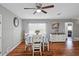 Inviting dining area with warm wood floors and a decorative table setting at 12280 Waco St, Spring Hill, FL 34609