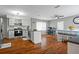 Bright kitchen with stainless steel appliances, granite countertops, and open access to the dining area at 12280 Waco St, Spring Hill, FL 34609
