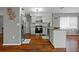Well-lit kitchen with stainless steel appliances, granite countertops, and modern cabinets at 12280 Waco St, Spring Hill, FL 34609