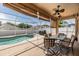 Enclosed outdoor space with a private pool and a hot tub, perfect for relaxation and enjoyment at 12519 Safari Ln, Riverview, FL 33579