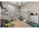 Cheerful bedroom featuring a unique house frame bed and playful decor throughout at 12519 Safari Ln, Riverview, FL 33579