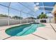 Beautiful screened-in pool with a connected spa, perfect for relaxing and entertaining guests at 12519 Safari Ln, Riverview, FL 33579