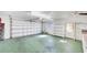 Spacious two-car garage with room for storage and a functional work area at 13850 Sunset Dr, Largo, FL 33774