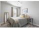 Bedroom with a neutral color palette, large window and plush carpeting at 14241 Natures Reserve Dr, Lithia, FL 33547