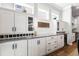 Custom dining area features built-in cabinets with a wine refrigerator at 14241 Natures Reserve Dr, Lithia, FL 33547