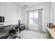 Bright office space with shiplap accent wall, modern light fixture, and large window with natural light at 14241 Natures Reserve Dr, Lithia, FL 33547