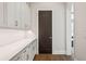 Walk-in pantry with lots of cabinet and counter space for storage and food preparation at 16121 Carencia Ln, Odessa, FL 33556