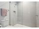 Modern shower with subway tile, glass enclosure, and rainfall showerhead at 16121 Carencia Ln, Odessa, FL 33556
