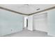 View of a bedroom with a closet and decorative trim, offering ample storage at 16315 2Nd E St, Redington Beach, FL 33708